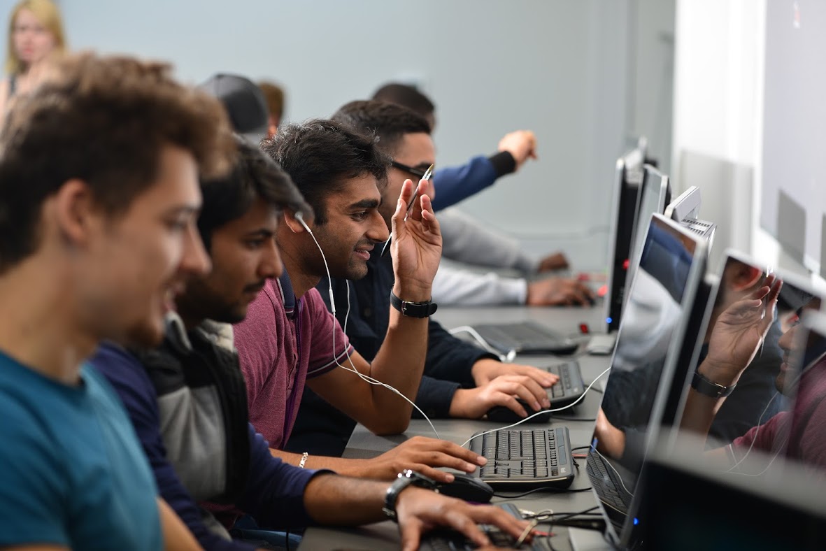 Group Of Studnts In An IT Class