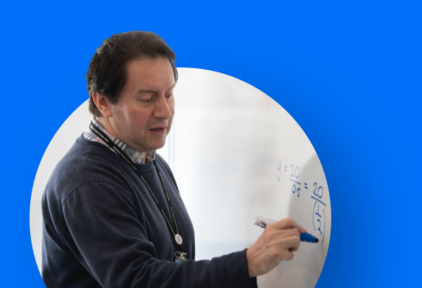 teacher writing on a board