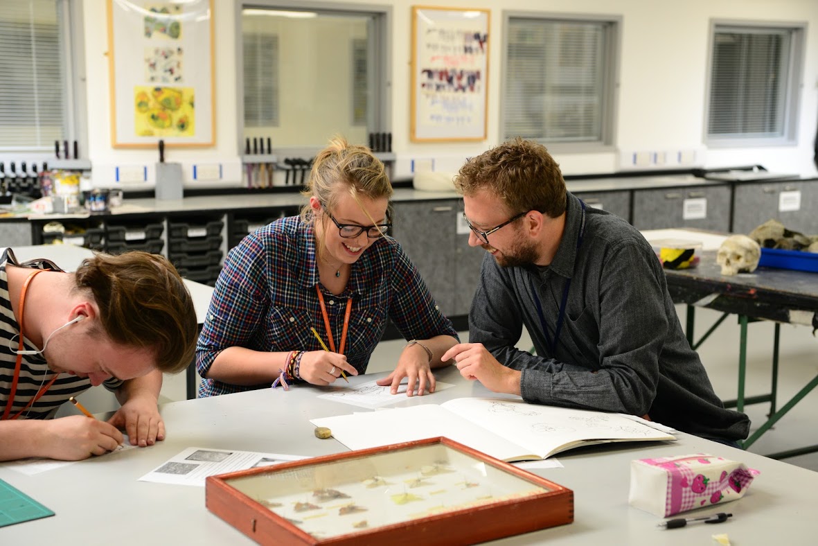 Student And Teacher In An Art Class