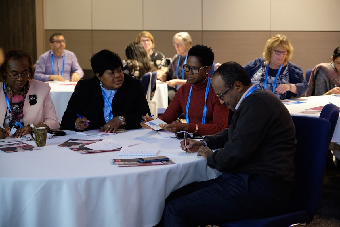 People Working On Group Activities At SET Conference